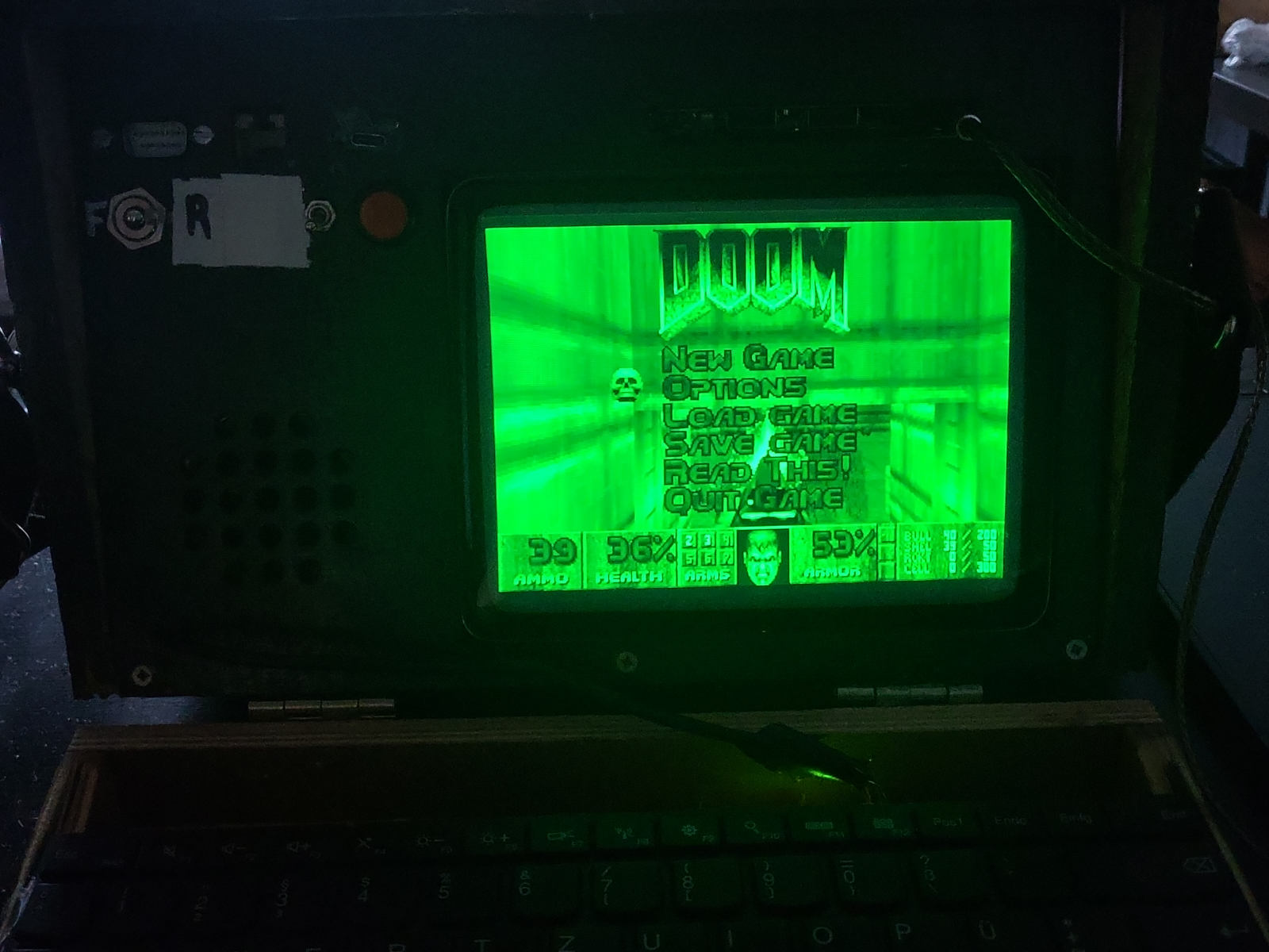 Title screen from the 1993 Doom displayed on a green CRT.