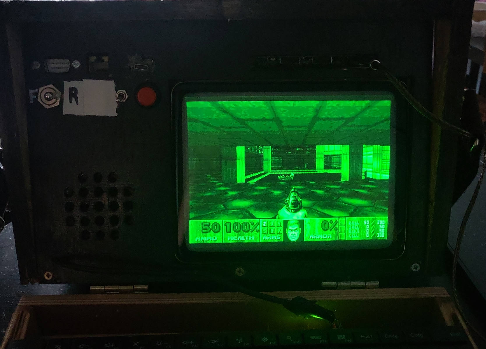 Beginning of the first map from Doom on a green CRT.